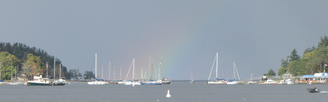 Rainbow over the ocean boats at parks of Nanaimo