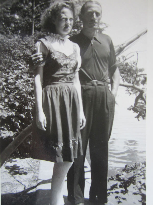 Old black and white photo of a man and wife