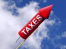 Increasing taxes shown on a rocket in the sky 